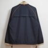 Navy Windbreaker with Beige Collar